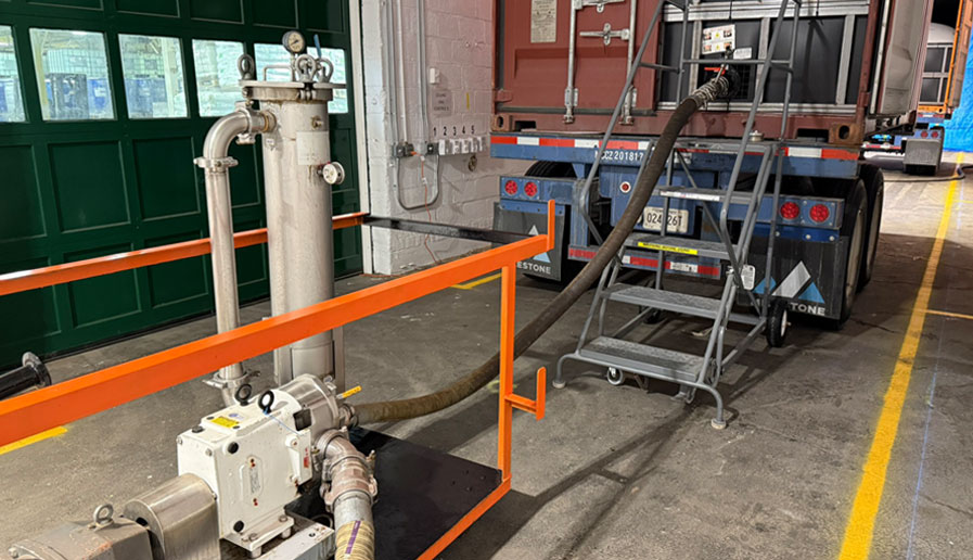 pump moving food grade liquids between flexi-tank in heating room